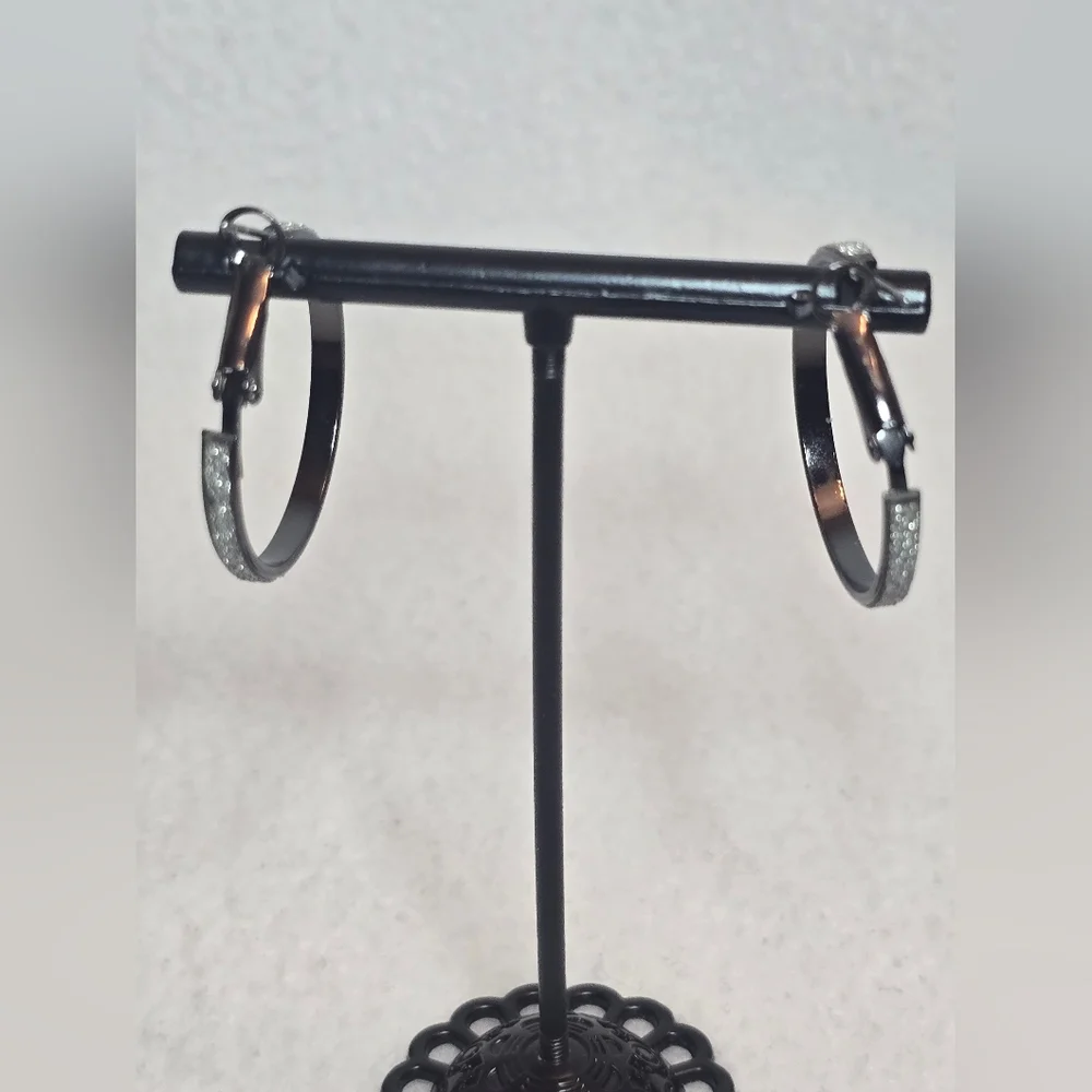 Black hoop earrings with sparkly rhinestones